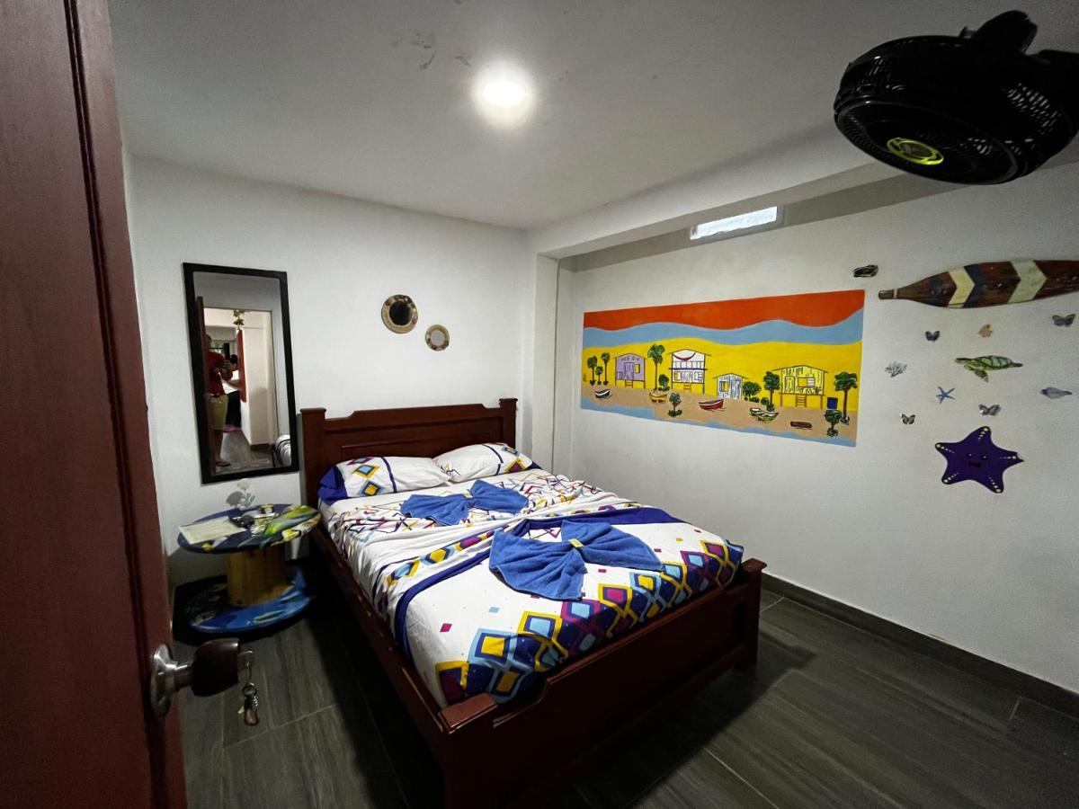 Acuarios Hostal Playa Ladrilleros Esterno foto
